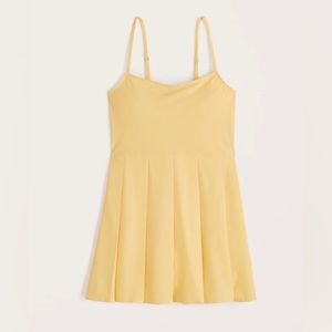 Pleated Traveler Mini Dress in Yellow